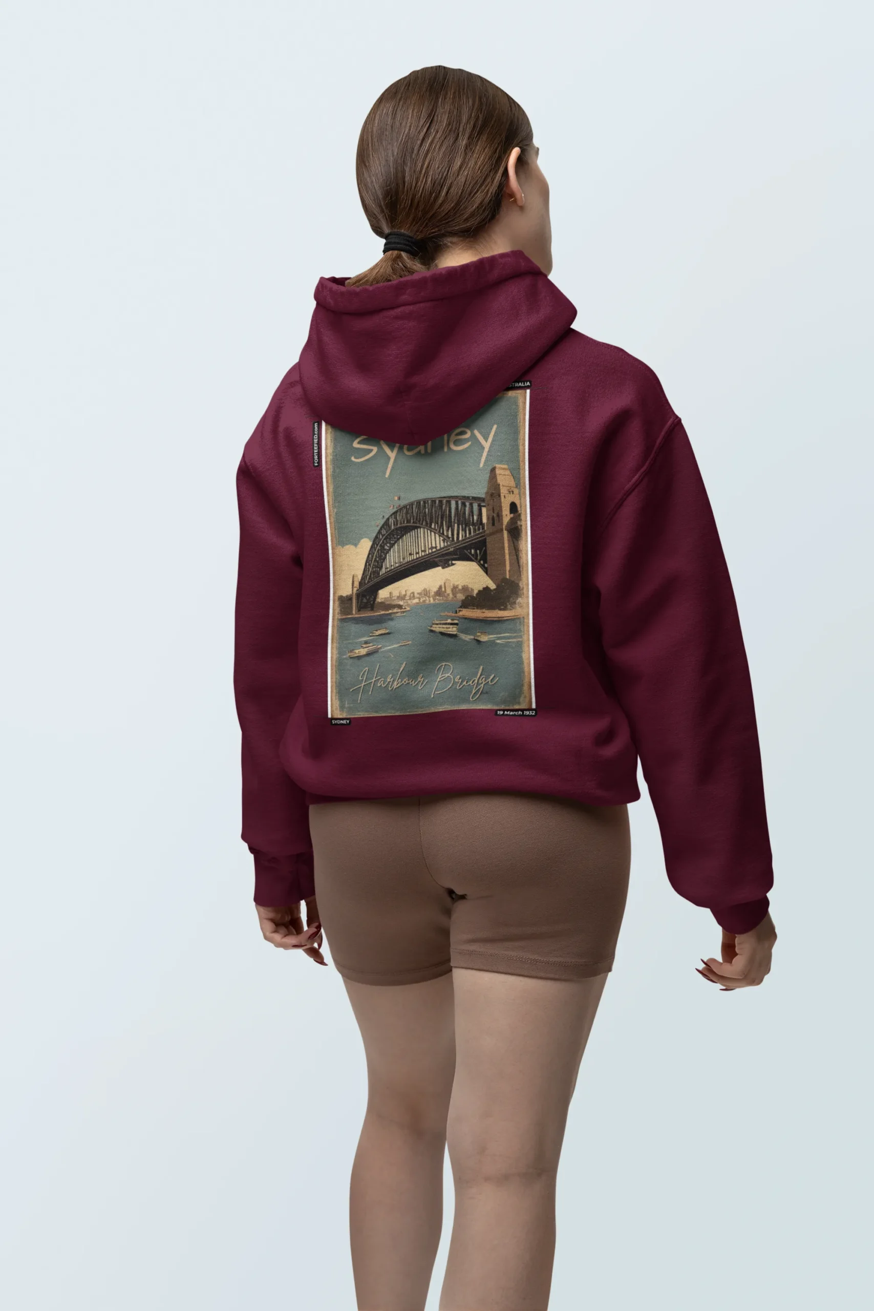 back-view-gildan-hoodie-mockup-of-a-woman-posing-in-a-customizable-background-m38557 (1)