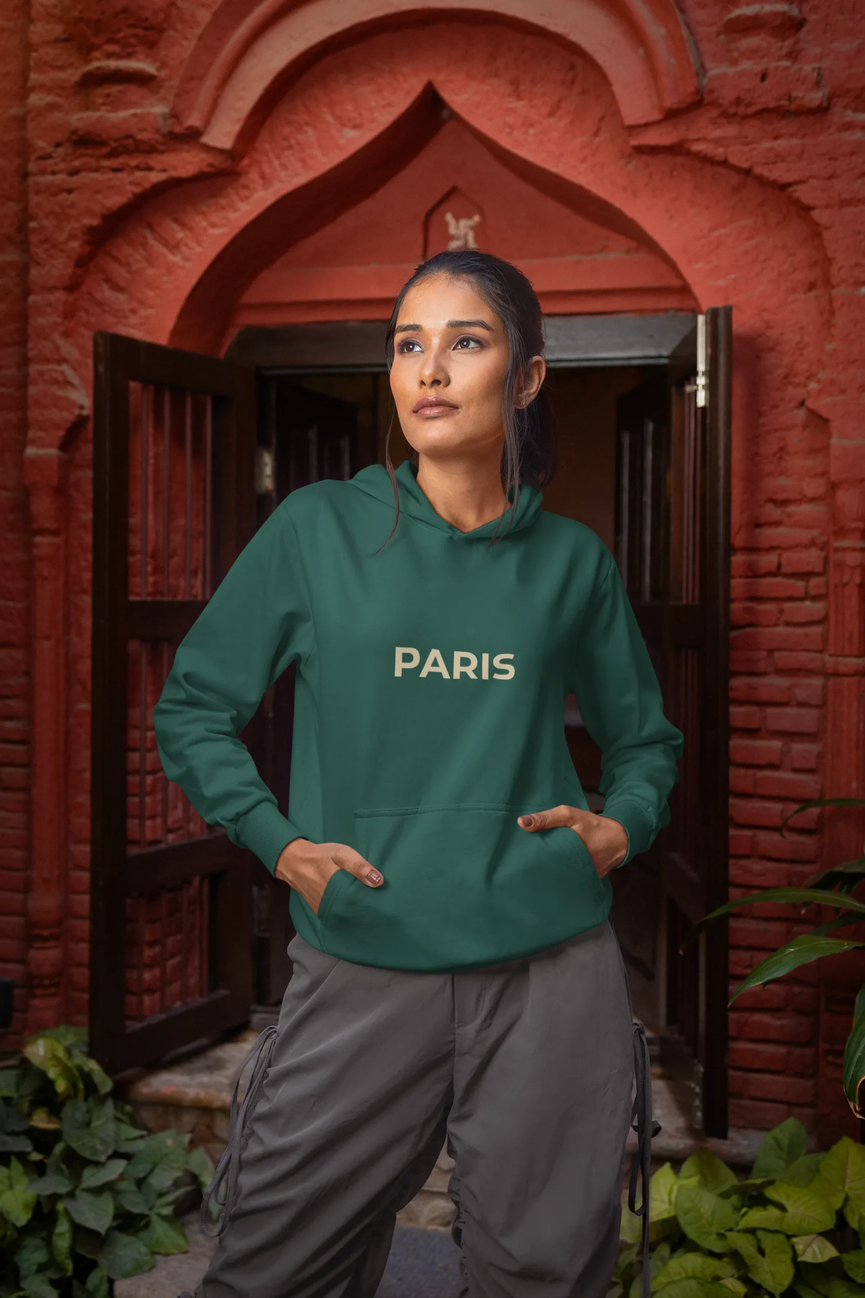 gildan-pullover-hoodie-mockup-featuring-a-woman-posing-in-front-of-a-building-m35389